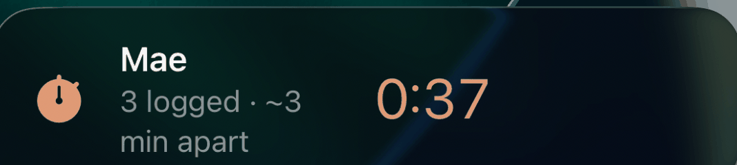 Lock Screen Live Activity showing a running contraction timer with contractions logged and average spacing